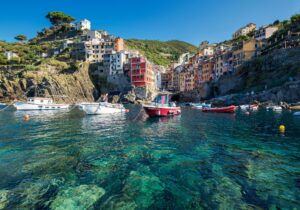 riomaggiore cinque terre italy colorful houses harbor boats