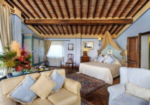 boutique hotel room detail vacation stay tuscany exposed beams