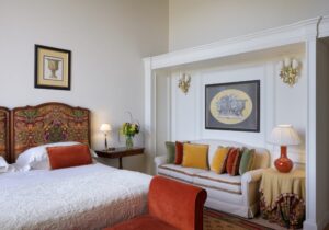 boutique hotel room detail vacation stay tuscany patterned headboard