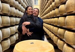 food valley tour parmigiano reggiano factory embracing couple