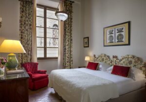 vacation rental luxury stay florence room detail floral headboard