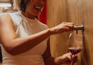 wine tours tuscany barrel pour