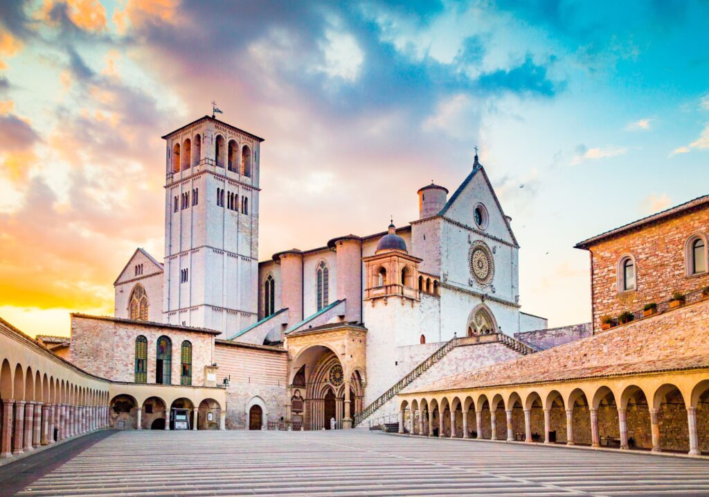Basilica of St. Francis of Assisi at sunset Assisi Umbria Italy