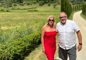 tuscan countryside couple road cypress trees summer